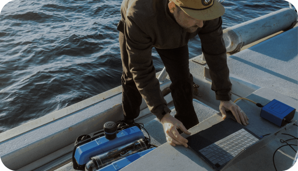 cockpit being used on laptop on boat